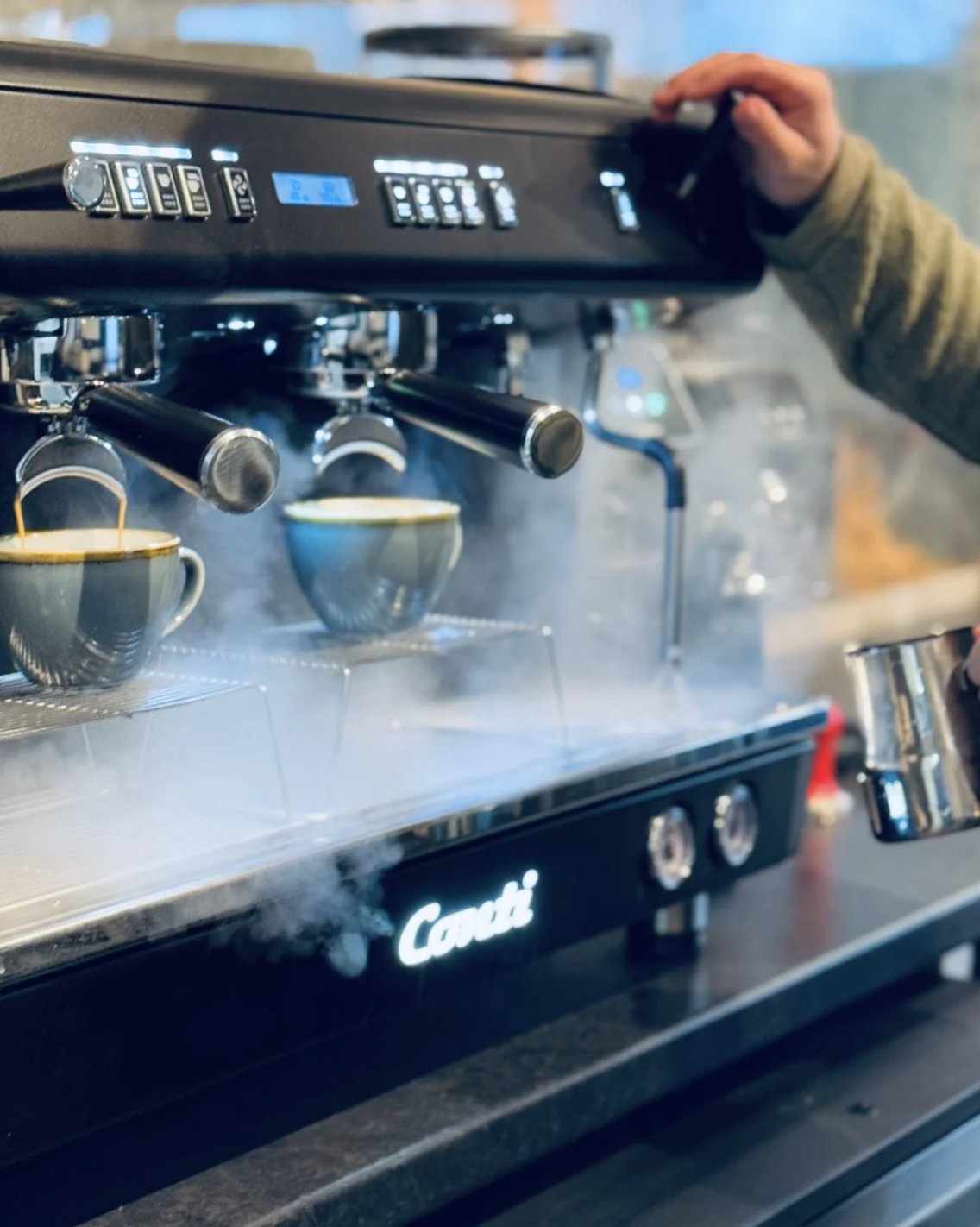 Espresso machine in action